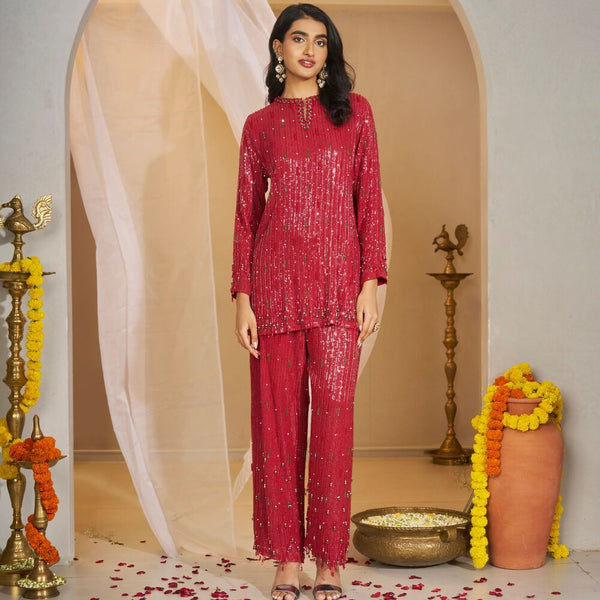 Pavitra-<br>Sequin georgette tunic with linear embroidery, paired with matching embroidered pants.