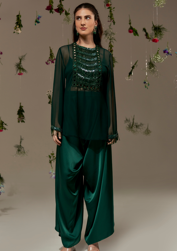 Short tunic with Cutwork and tassels paired with bustier and Draped Pants